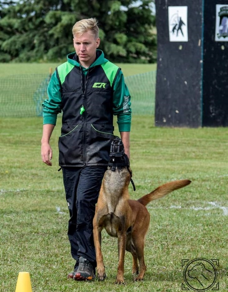 dog trainer and dog sport competitor, Dane Seidlitz competiting in Ring Sport with his Maliois Aegon